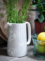 Grey ceramic jug on kitchen worktop  