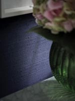 Detail of purple painted wall - Cut hydrangea flowers in vase 