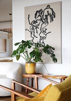 Large houseplant in modern living room 