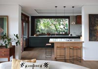 Modern kitchen in open plan living space 