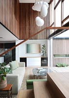 View from staircase of contemporary open plan living space 