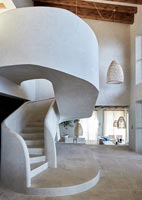 Unusual white moulded spiral staircase 