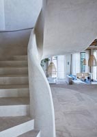 Unusual white moulded spiral staircase 