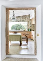 View through doorway to country kitchen-diner