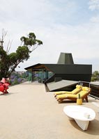 Modern outdoor living area on contemporary roof terrace 