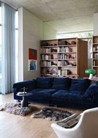 Large blue sofa in modern living room 