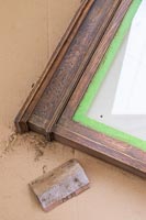 Rubbing down old wooden frame - memories notice board 