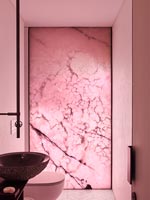 Decorative door in pink modern bathroom 
