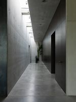 Narrow concrete corridor 