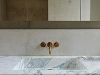 Marble sink in modern bathroom 