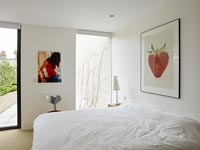 Artwork on modern bedroom wall 