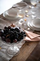 Black fruit in glass bowl detail 