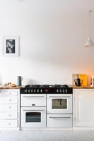 Black and white range cooker in modern kitchen 