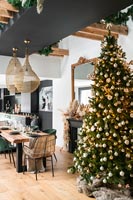 Christmas tree in modern kitchen-diner 