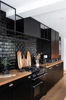 Modern black, white and wooden kitchen 