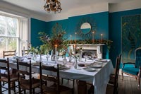 Dining room with blue painted walls - decorated for Christmas 