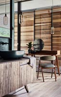 Black and brown wooden bathroom with dressing table 