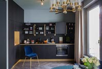 Black, grey and gold modern kitchen-diner 