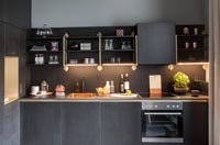Black, grey and gold modern kitchen