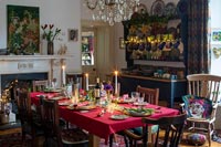 Country dining room decorated for Christmas dinner 
