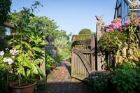 Wooden garden gate to country garden