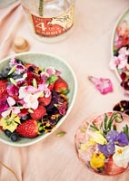 Bowl of fruit and edible flowers - detail 