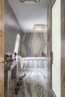Unusual grey marbled modern bathroom 