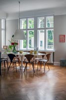 Modern dining room with parquet flooring 