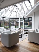 Living area in modern conservatory 