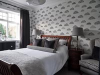 Grey cloud wallpaper in modern bedroom 