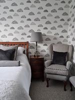 Grey cloud wallpaper in modern bedroom 