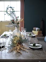 Dining table decorated for Christmas 