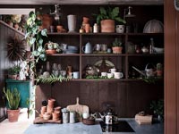 Wooden shelving in modern country kitchen 
