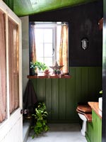 Green and black painted bathroom 