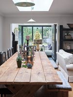Modern dining room with Christmas decorations 