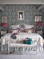 Pet dogs in modern bedroom at Christmas time 