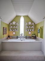 Bathroom with green painted walls 