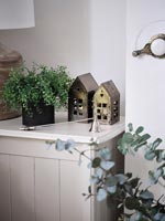 Tealight lanterns in shape of small houses  