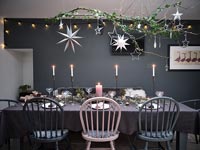 Modern dining table decorated for Christmas 