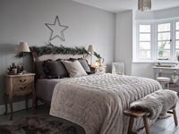 Modern bedroom decorated for Christmas 