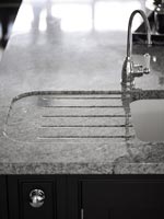 Grey marble kitchen sink detail 