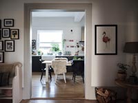 View through doorway to modern kitchen-diner 