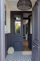 Grey painted doors in entrance hall 