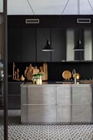 Modern kitchen with stainless steel island 