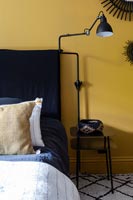 Modern lamp in black and yellow modern bedroom 