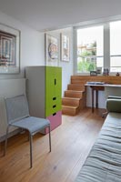 Colourful cabinet in modern study 