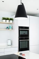 Cooker in modern black and white kitchen 