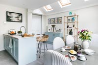 Pale blue modern kitchen-diner 
