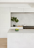 Concrete island in contemporary kitchen 