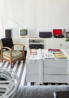 Sideboard, chair and coffee table with retro television and record player